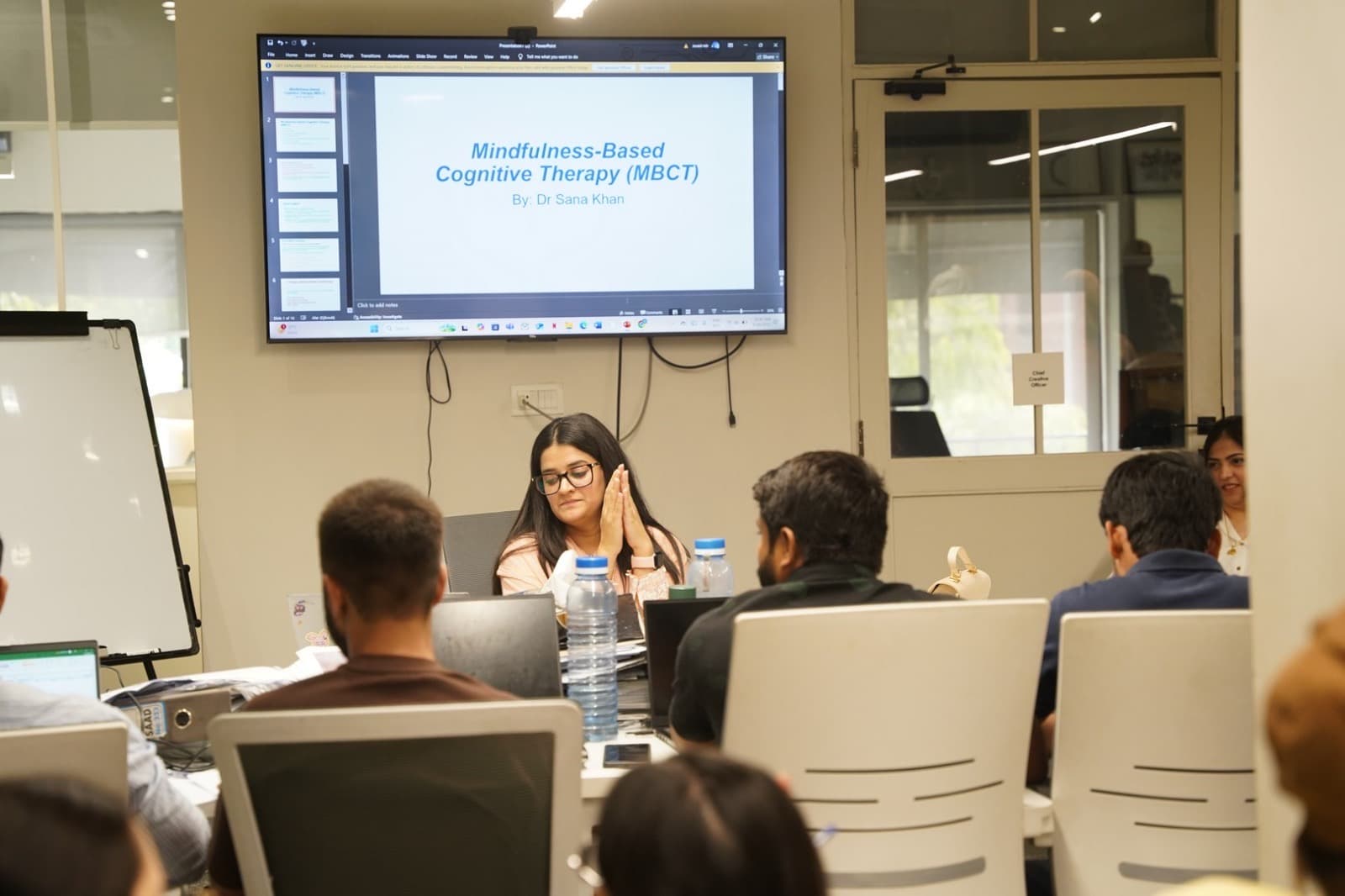 Sana Khan teaching Mindfulness-Based Cognitive Therapy (MBCT) in a corporate workshop